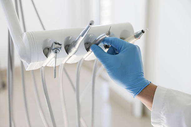 Professional Tooth Extraction technician working in Cane Savannah, SC